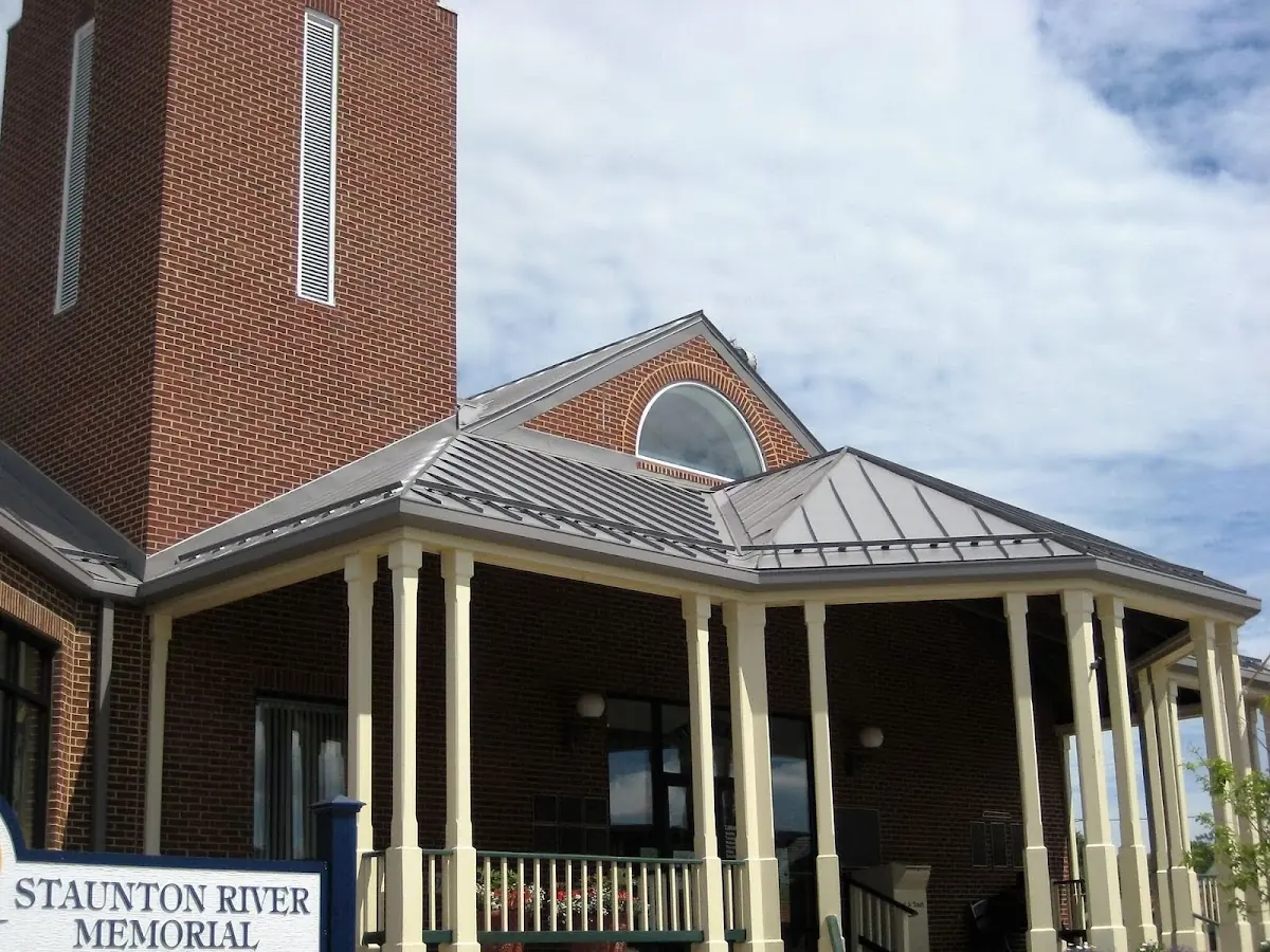 Skilled roofing craftsmen working on a residential roof in Speedwell
